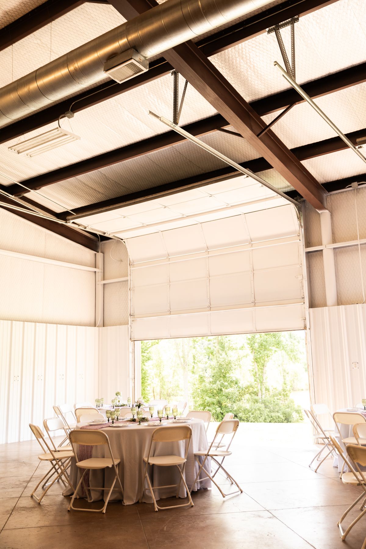 Light-filled event space with open-air doors at Heritage Hall